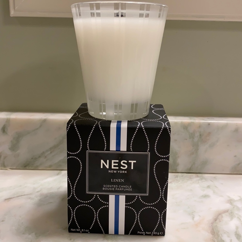 NEST linen candle.  8.1 oz.  Apple blossom., white orchid and linen scent.